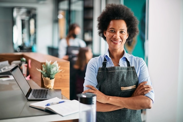 Happy small business owner using Organizely for warehouse management