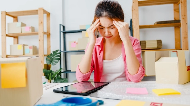 Stressed out business owner from purchase order issues